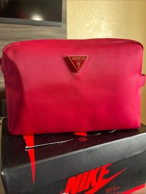 GUESS Red Men's Toiletry Pouch with Logo Triangle